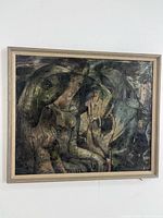 Framed abstract figurative oil painting on board hung on wall