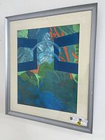 Full view of framed abstract watercolour showing composition, mat and frame
