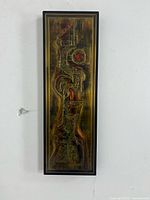 full view of framed acid-etched panel