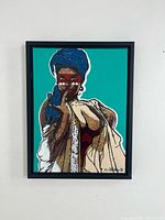 Frontal view of framed pop art painting