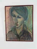 Full view of framed pastel portrait