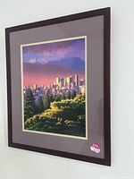 Full view of framed lithograph on wall