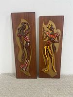 Both Maurice Chalvignac plaques front view