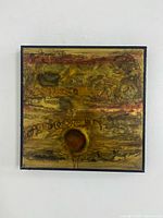 Front view of signed Bernhard Rohne acid-etched artwork in frame