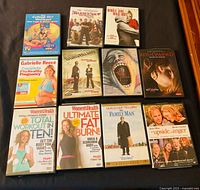 All 11 DVD cases laid out to show front covers