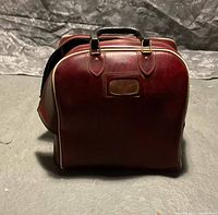 Closed red bowling bag front view