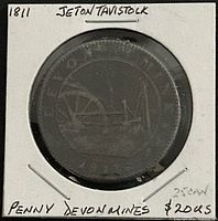 Front of 1811 Tavistock Devon Mines penny token in cardboard flip