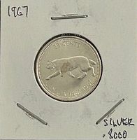 Reverse of 1867-1967 Canadian 25-cent coin showing bobcat design