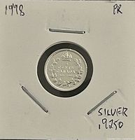 Reverse side showing crowned 5 Cents Canada design