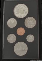 Obverse design side of seven-coin proof set in holder