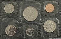 Front view of six 1985 Canadian coins in sealed RCM packaging