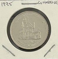 Obverse of 1995 City of Summerside PEI trade dollar showing historic building and inscriptions