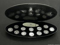 Closed-view of entire open presentation case showing all coins in place