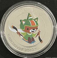 Reverse showing colour Sumi mascot on sledge with denomination and year