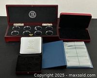 All four coin storage items arranged together