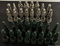 Full set of 32 chess pieces, two colours
