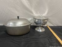 Roaster and chafing dish side by side with ruler for scale