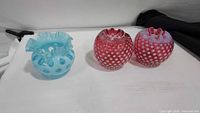 Group shot of three Fenton coin dot vases