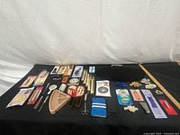 Overview of entire lot laid out on black cloth