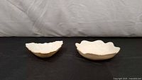 Triangular and scalloped bowls side by side