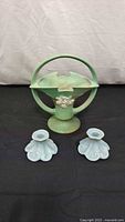 Full lot with Roseville basket and pair of Weller candlesticks