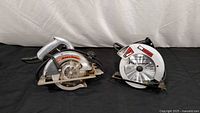 Two circular saws side by side: Black & Decker on left, Craftsman on right