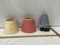 Group shot showing three lamp shades and mini lamp