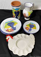 All six ceramic items grouped together