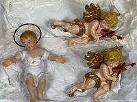 All three items on tissue paper showing sizes and details