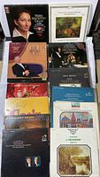 Stack of approximately 14 classical LPs showing front jackets
