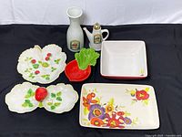 All eight ceramic pieces displayed together