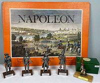 Front view of all items including print portfolio, four pewter figures, King & Country boxed figure