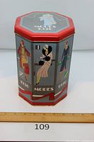 Front view showing three illustrated panels and lid