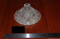 Full view of butter dish with ruler for scale