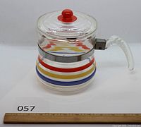 Coffee pot assembled with lid showing stripes and handle