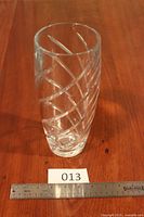 Full view of vase with ruler for scale