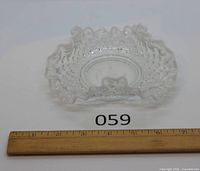 Top view showing crimped hobnail dish with ruler for scale