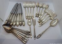 All 27 pieces laid out showing pattern and variety