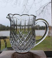 Full view of crystal pitcher showing pattern and handle