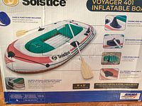 Front of retail box showing model, size, capacity, included accessories