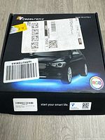 Closed retail box showing branding, model and RGB indication