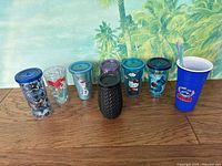 All eight tumblers grouped on tabletop