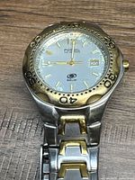 Front view showing dial, bezel, bracelet