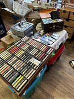 Wide view of cassette collection, vinyl case, Sony bag and organizer tray