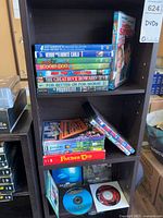 Front view of shelving with multiple DVD cases