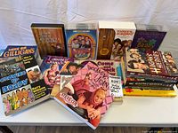 Overall shot of all DVDs and books laid out on table