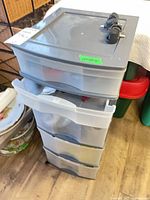 Full view of plastic drawer unit with drawers and casters
