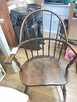 Front view of wood hoop-back spindle chair