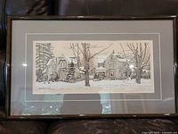 Full view of framed print on sofa