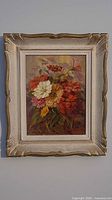 Full view of framed floral oil painting